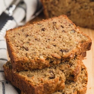 slices of banana bread on a wood board