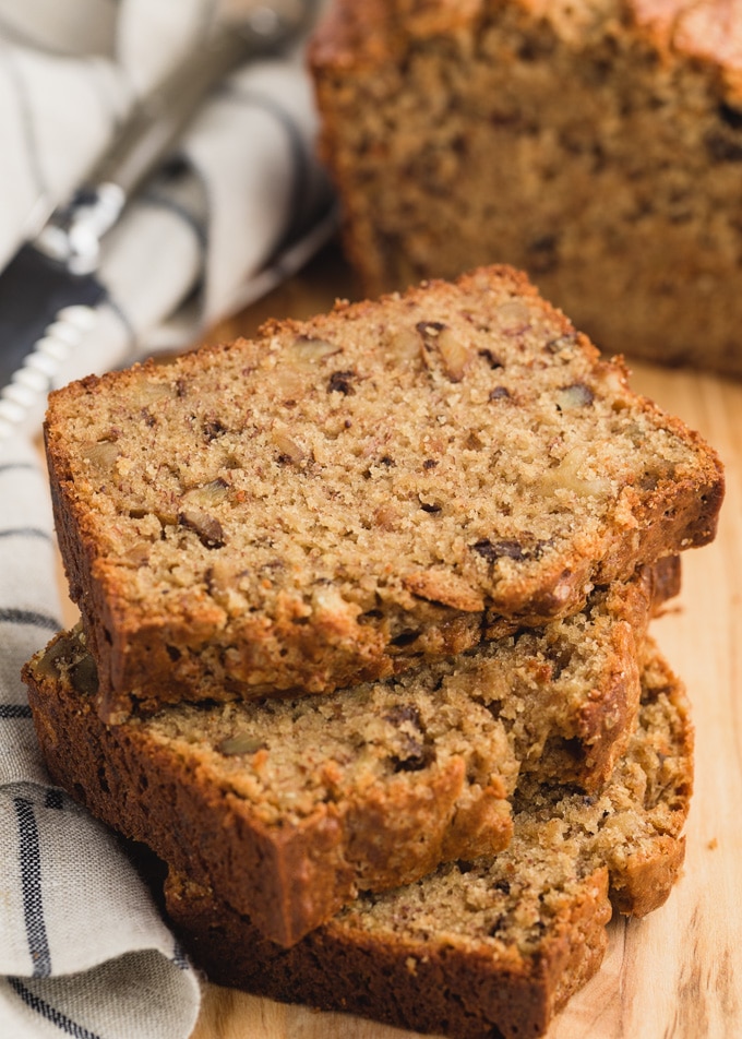 slices of banana bread on a wood board