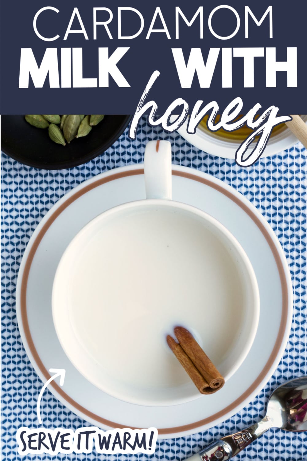 cardamom milk in a teacup with a cinnamon stick. text reads "cardamom milk with honey" and serve it warm!"