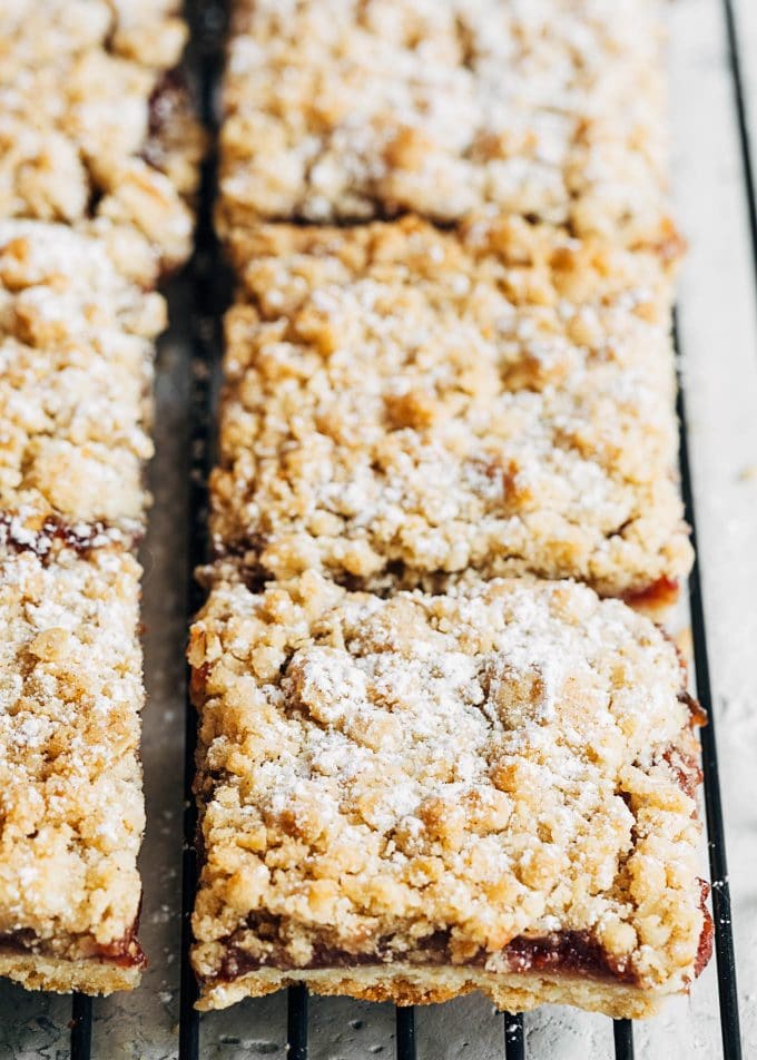 jam bars with crumble topping on a cooling rack