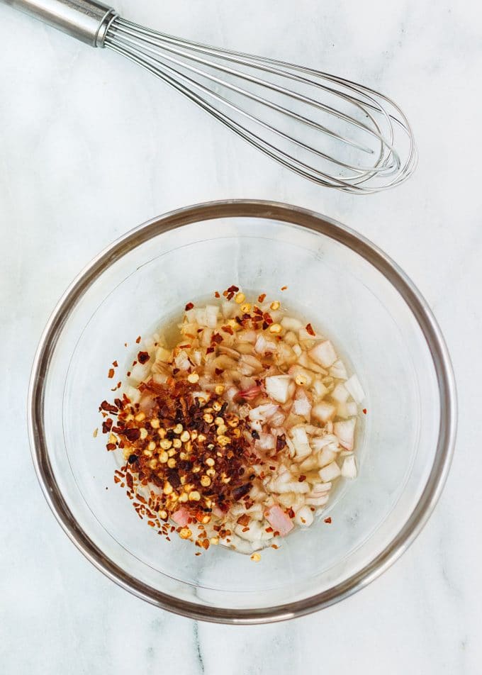 ingredients for brown butter apple cider vinaigrette in a mixing bowl