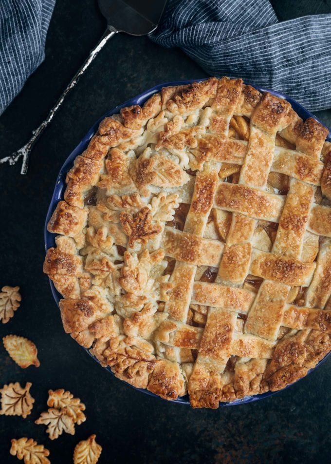 baked lattice apple pie with leaf crust cutouts