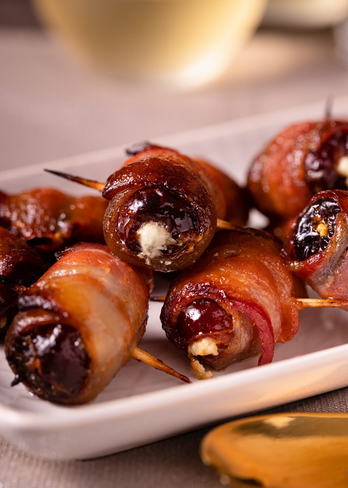 closeup of devils on horseback on a white platter