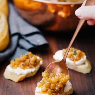 caramelized onion pear jam on goat cheese crostini