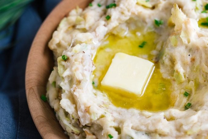 pat of irish butter melting into a bowl of colcannon