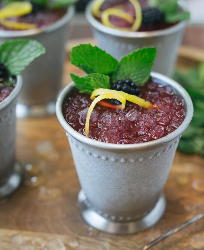 blackberry lemon mint julep recipe in a julep cup