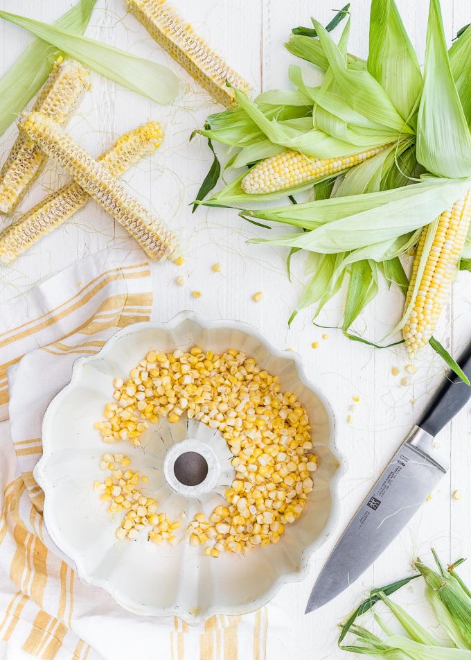 corn on the cob and corn kernels in a bundt pan