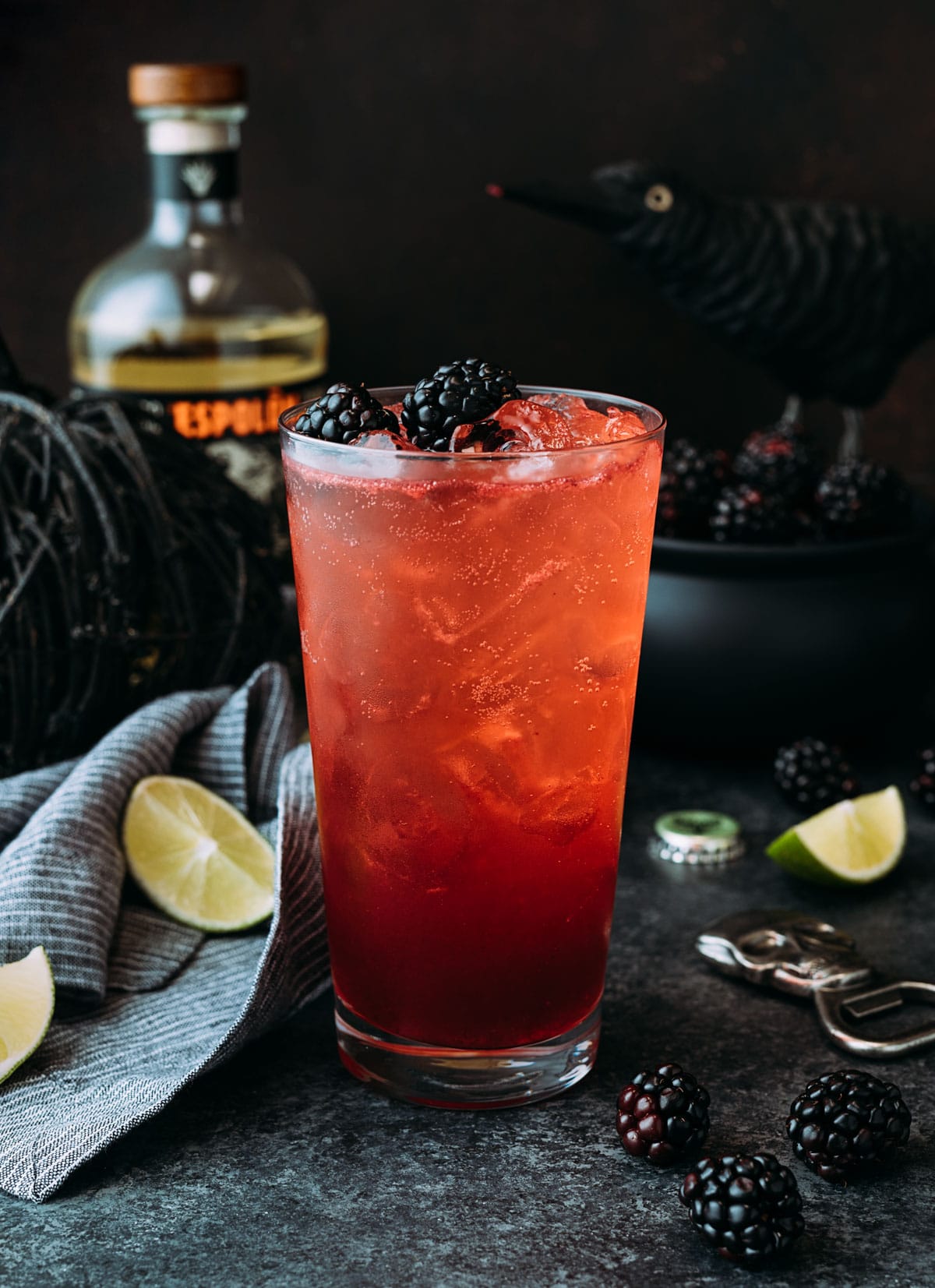 blackberry el diablo cocktail in a halloween themed scene