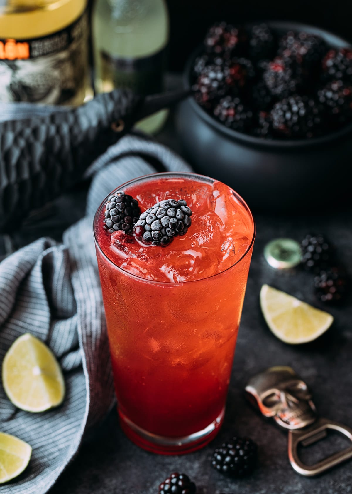 blackberry el diablo cocktail in a highball glass with Halloween decor