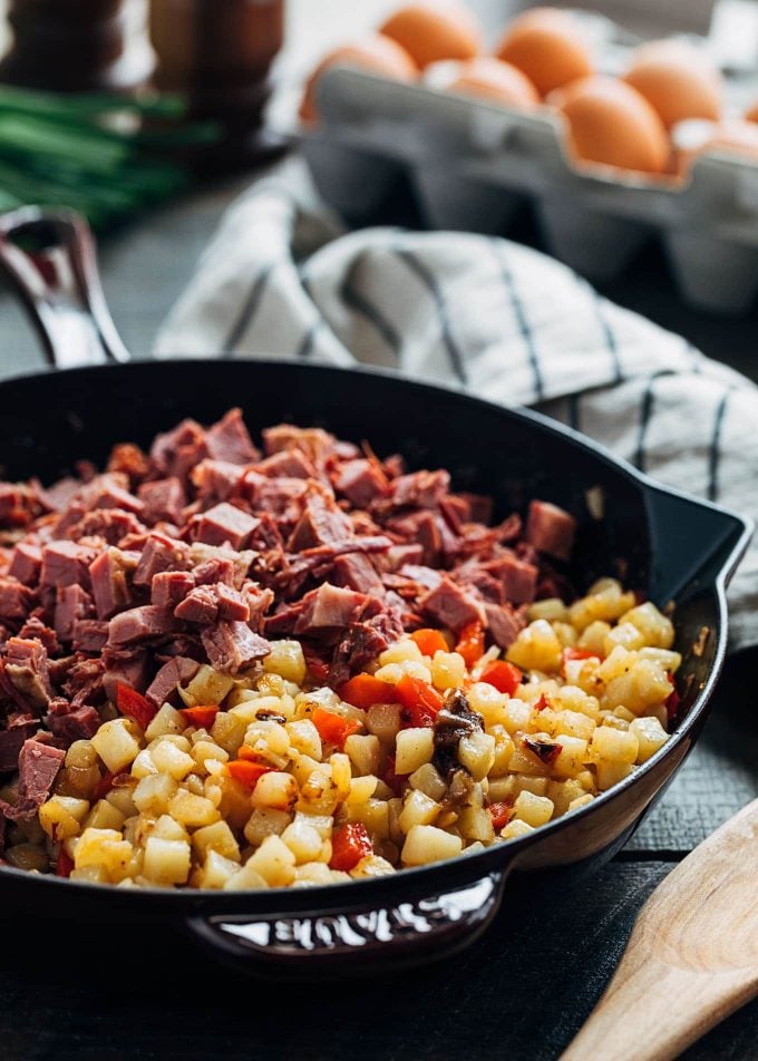 potatoes and corned beef in a skillet