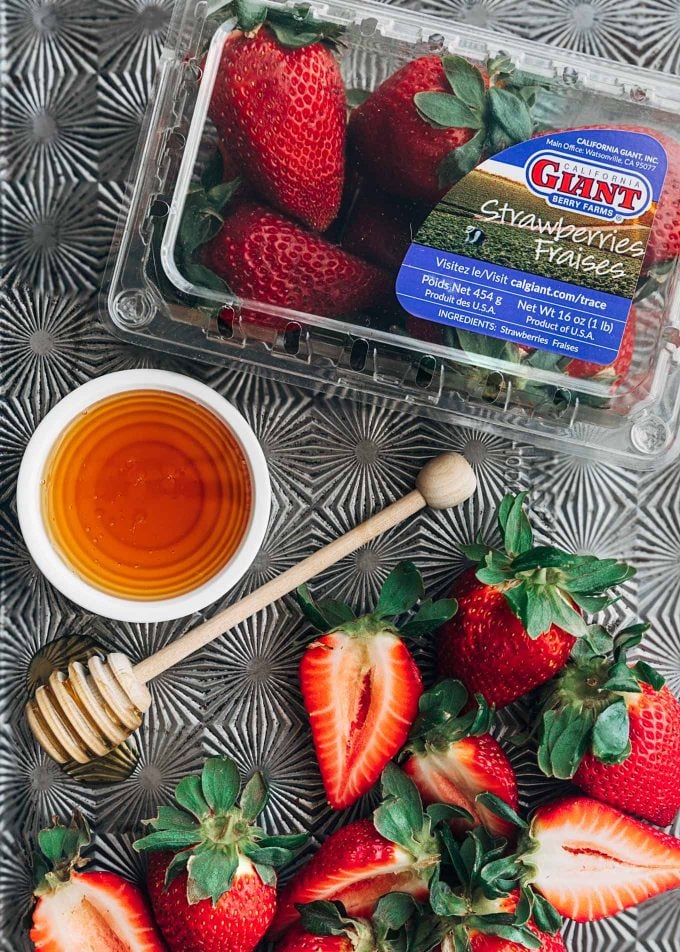 california giant berry farms strawberries on a roasting pan with honey {sponsored}