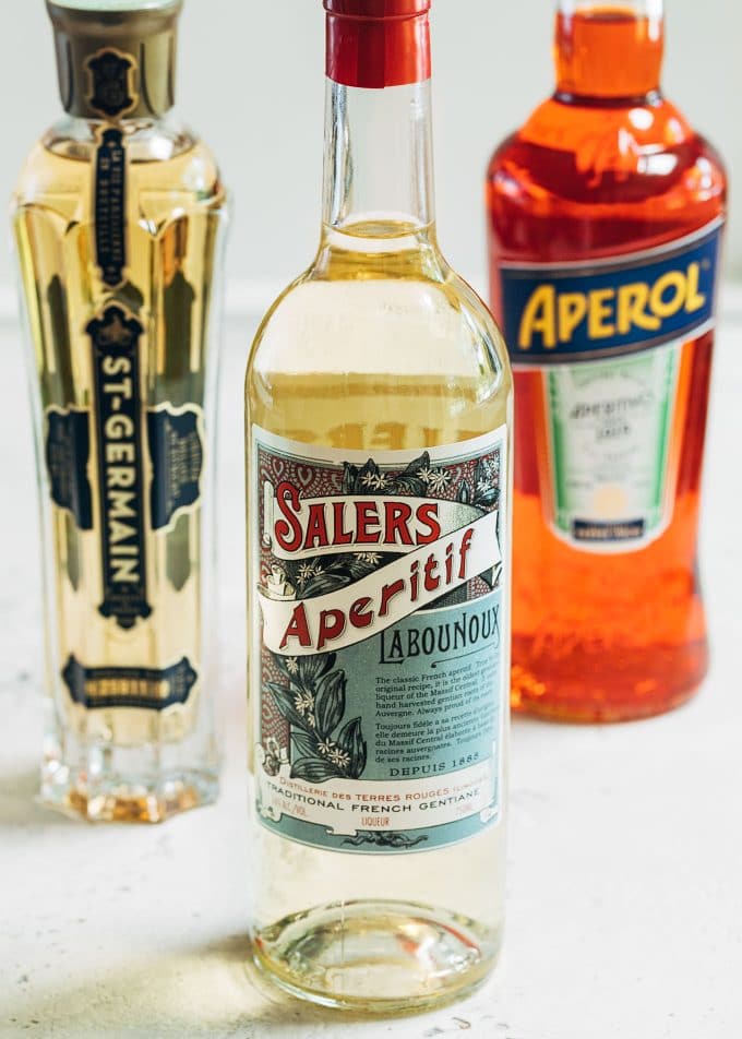 bottles of st. germain, salers aperitif, and aperol