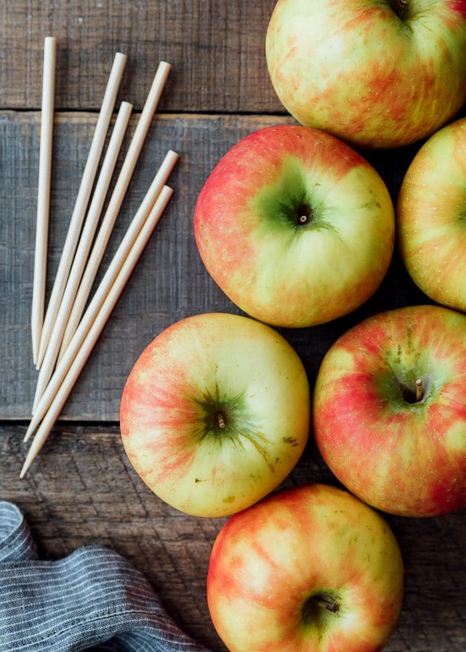 honeycrisp apples on a board with dipping sticks