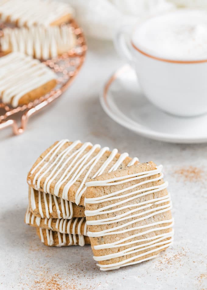 stack of chai shortbread cookies with a chai latte