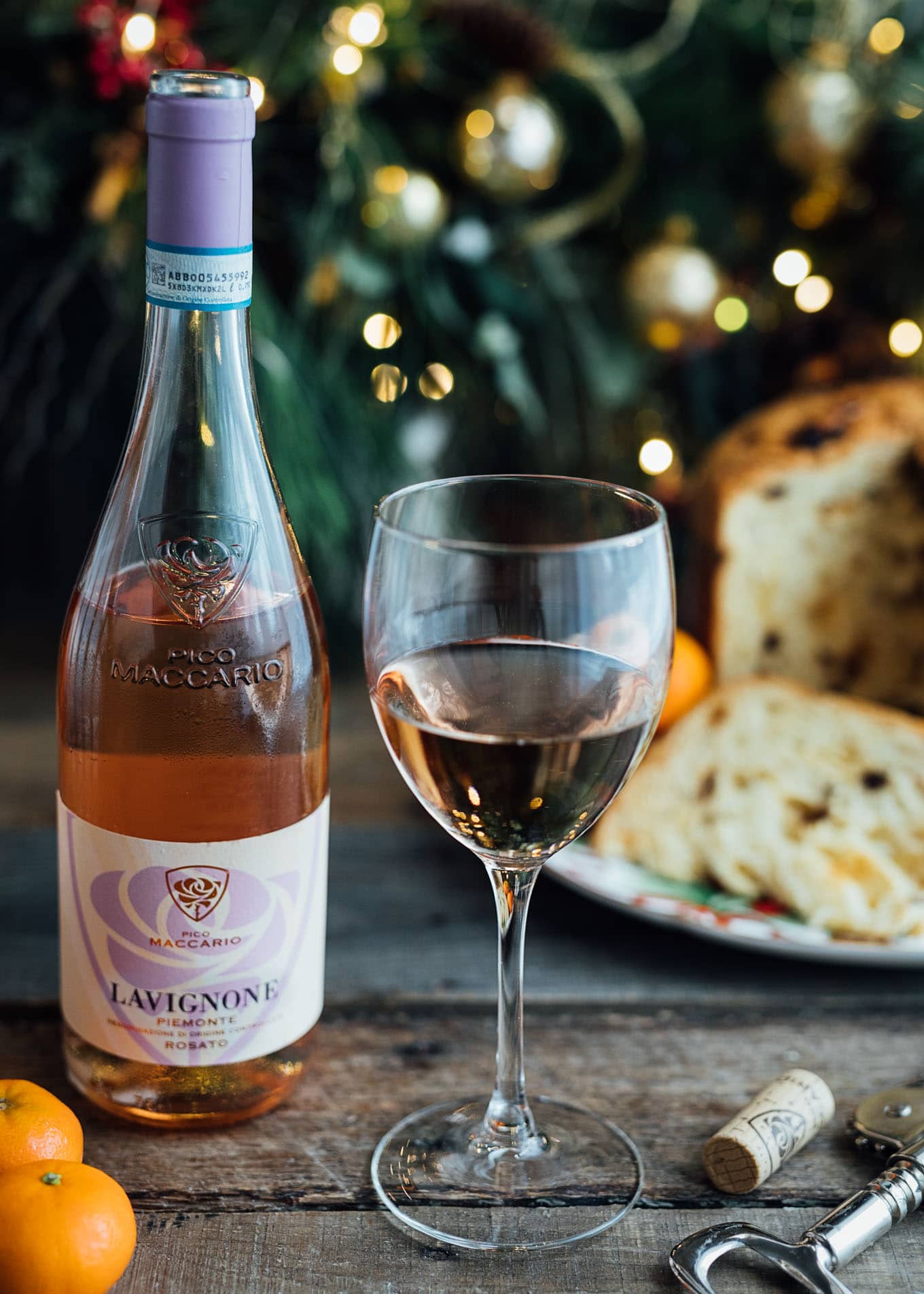 glass of Pico Maccario Barbera ‘Lavignone’ rose wine with a poured glass and panettone