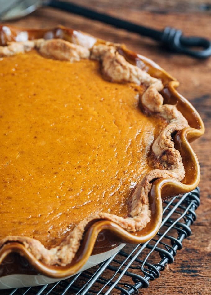 baked pumpkin pie on a cooling rack