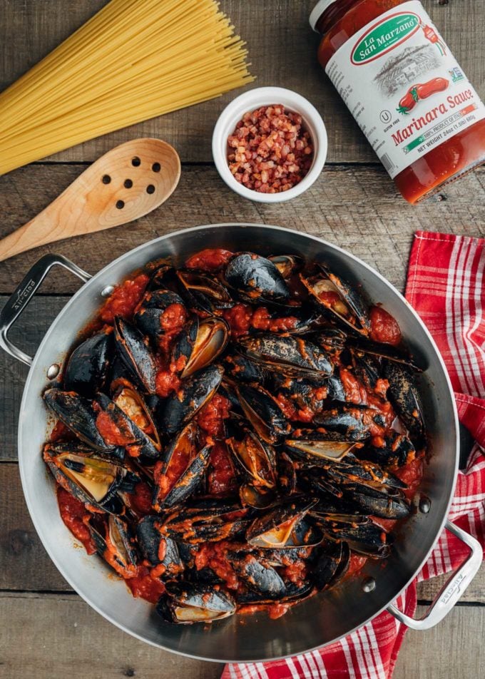 mussels in La Regina di San Marzano tomato sauce in a pan {sponsored}