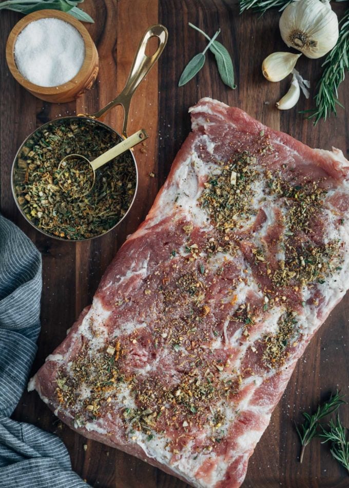 pork belly rubbed with spices for porchetta