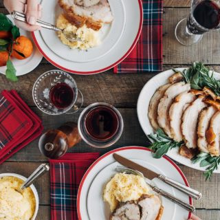 porchetta served at a holiday table setting