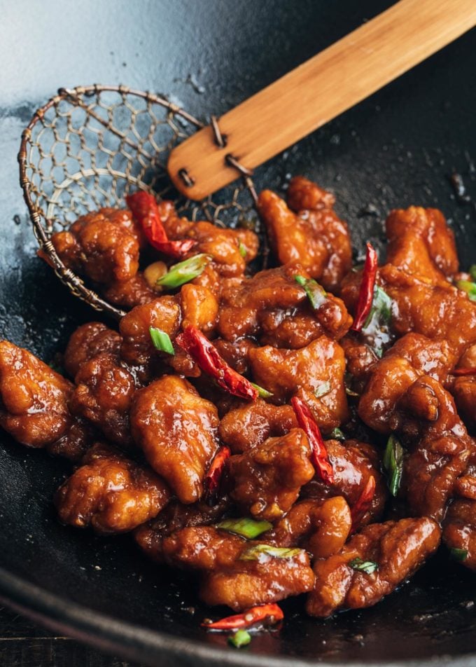 General Tso's chicken with dried red chilies in a wok