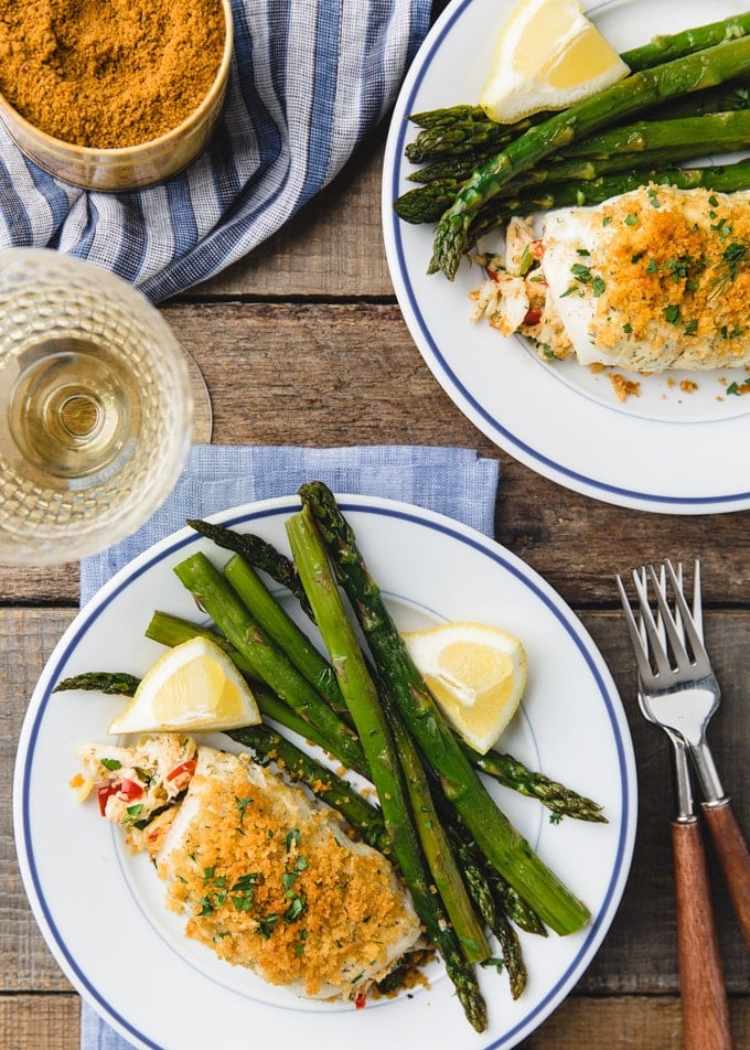 {sponsored} overhead photo of crab stuffed flounder on white plates with asparagus