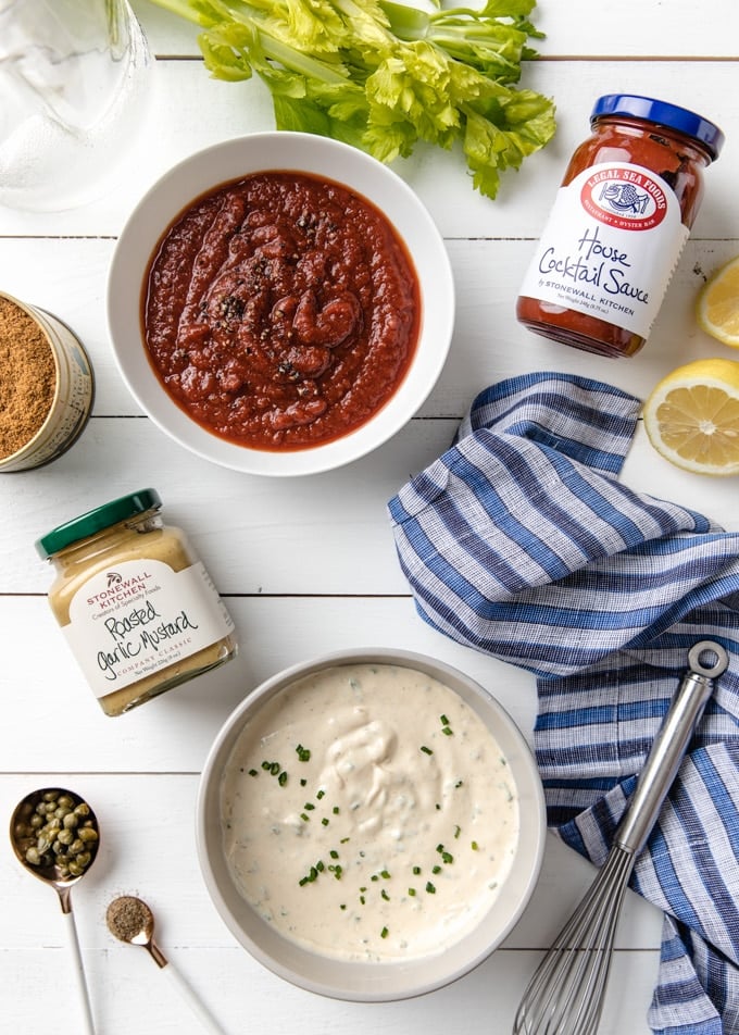 {sponsored} bowls of bloody mary cocktail sauce and roasted garlic remoulade with jars of stonewall kitchen products