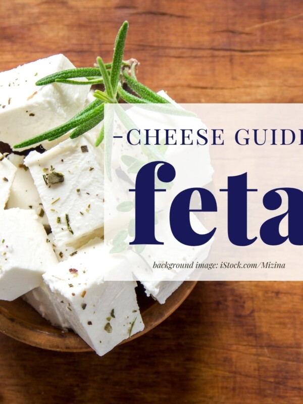 closeup of a bowl of cubed feta with text overlay that reads "cheese guide- feta"