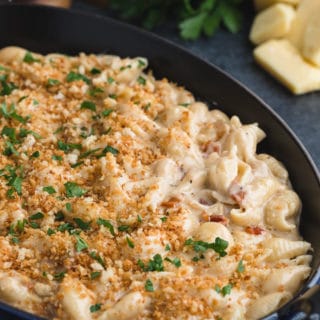 pan of gouda macaroni and cheese topped with toasted panko breadcrumbs