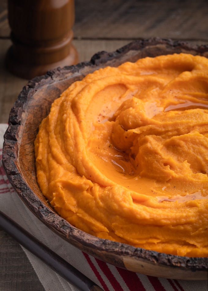 brown butter whipped sweet potatoes in a wooden bowl