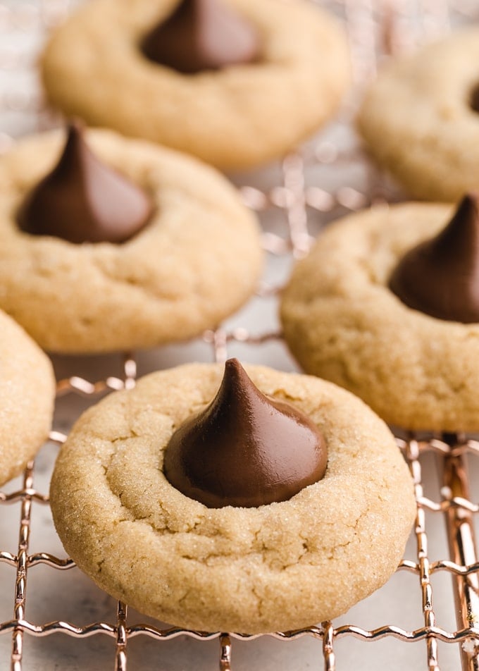 peanut butter blossoms on a wire cooling rack