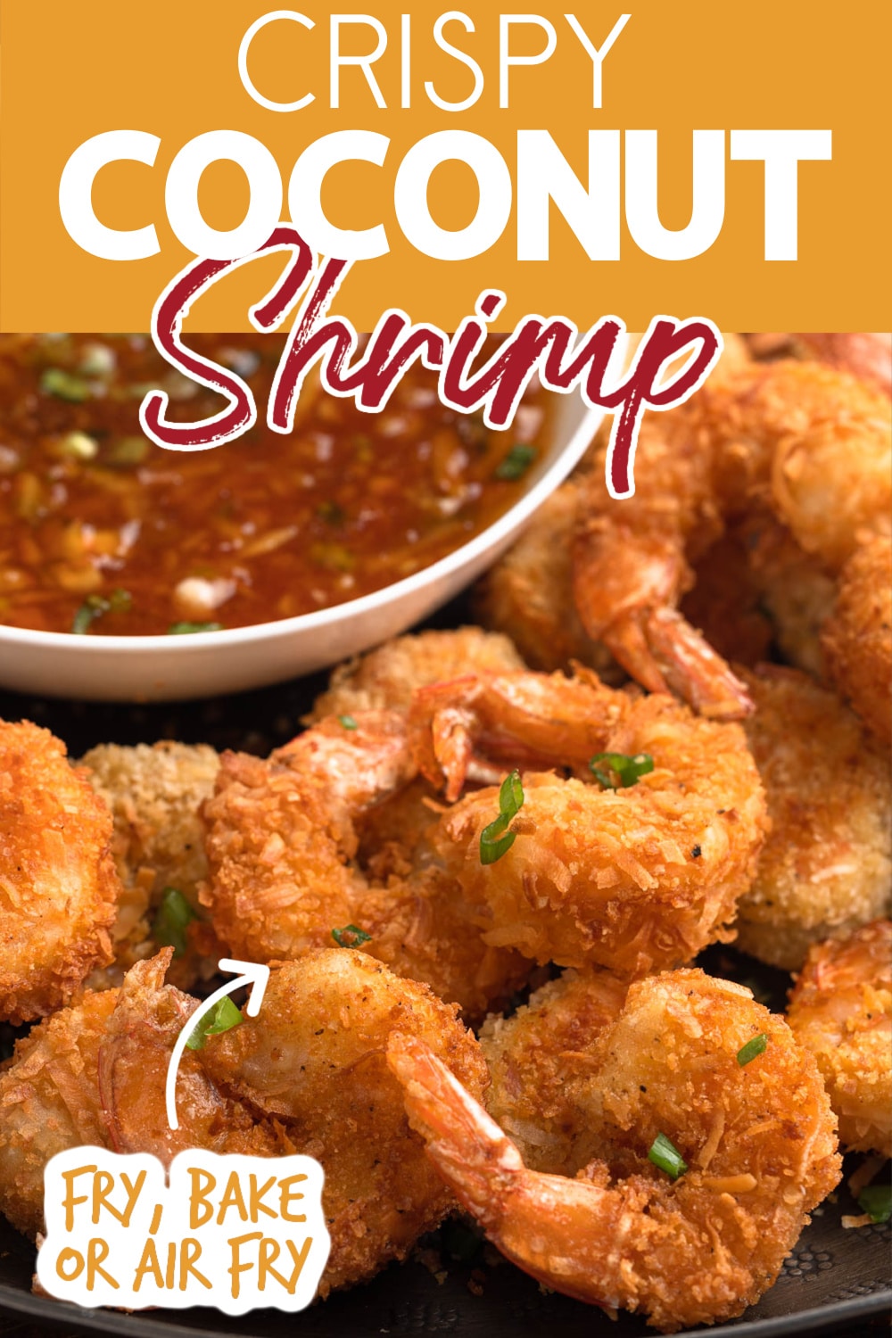 coconut shrimp on a serving platter with a bowl of orange chili dipping sauce. Text reads "crispy coconut shrimp" "fry, bake, or air fry"
