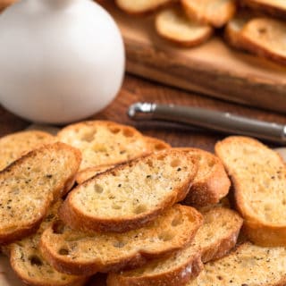 baked crostini toasts on parchment paper