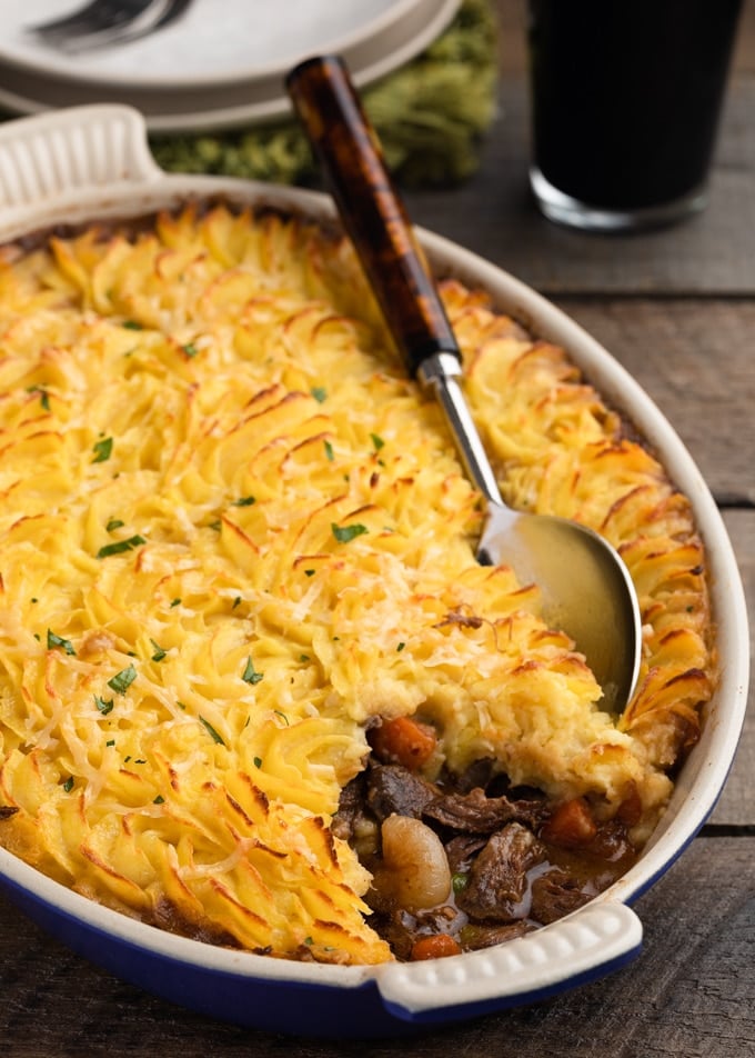 short rib cottage pie in an oval gratin dish