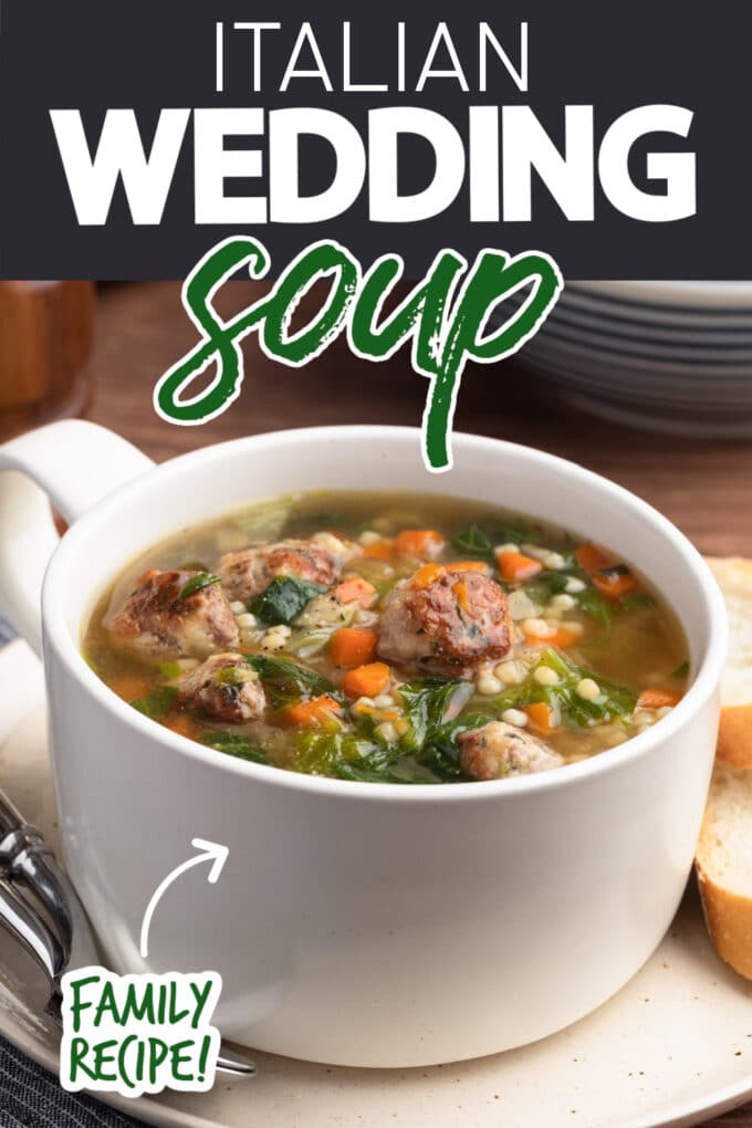 closeup of Italian Wedding Soup in a white handled ceramic bowl with "Italian Wedding Soup" and "Family recipe!" text overlys