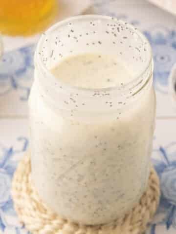creamy poppy seed dressing in a mason jar