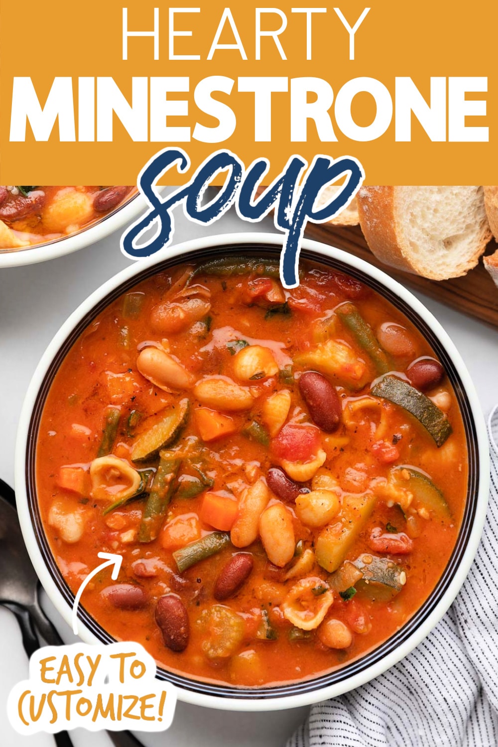 overhead of minestrone soup in a blue and white striped bowl. Text reads "Hearty Minestrone Soup" "easy to customize!"