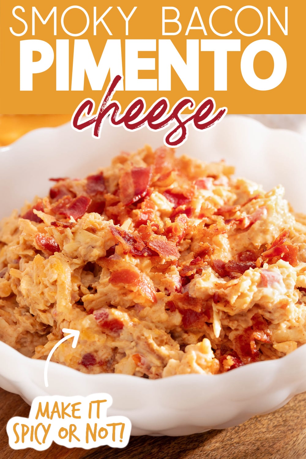 bacon pimento cheese in a white scalloped bowl. Text reads "Smoky Bacon Pimento Cheese" "Make it Spicy or Not!"