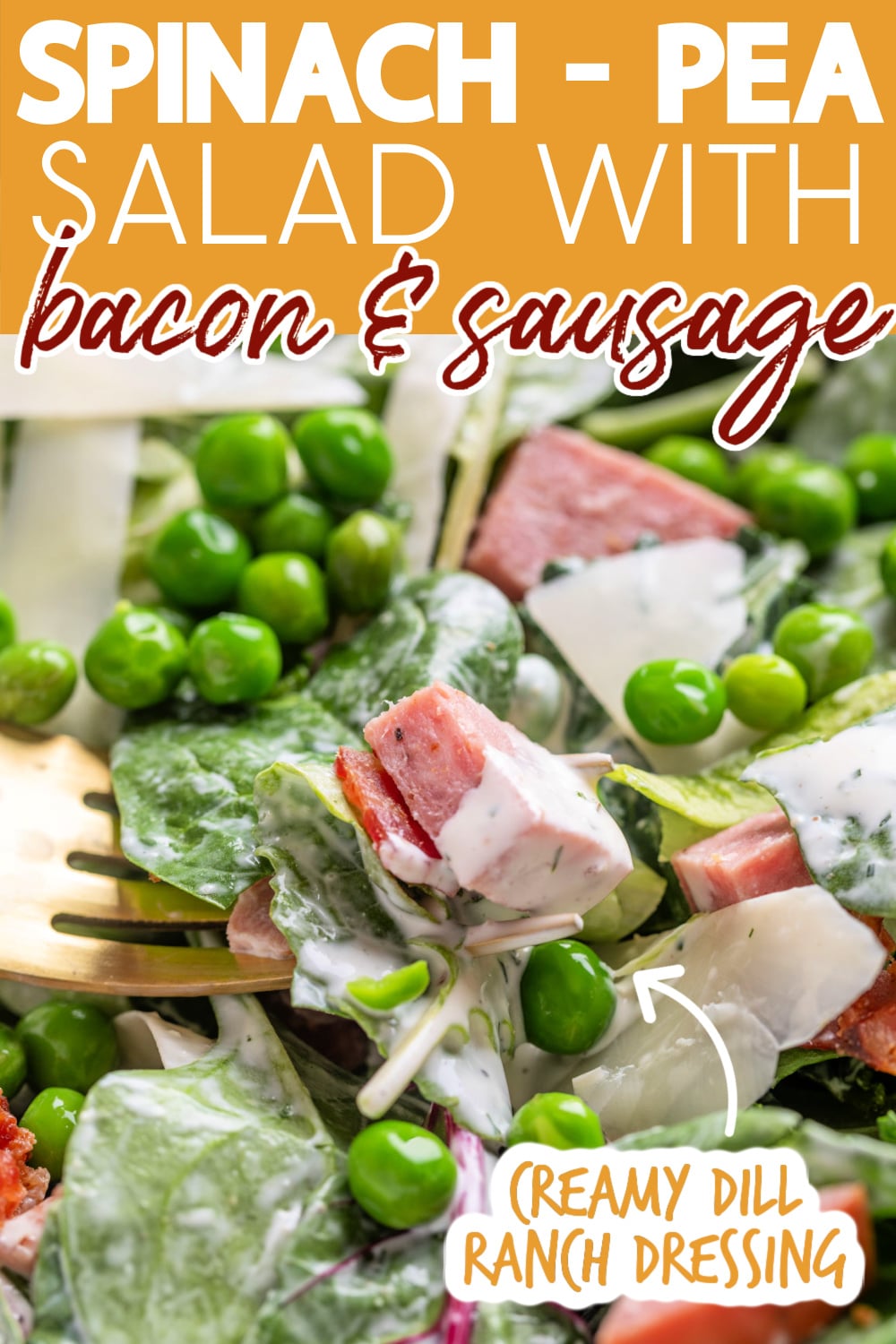 closeup of spinach and pea salad dressed with ranch dressing in a bowl with a fork. Text reads "spinach-pea salad with bacon & sausage" "creamy dill ranch dressing"